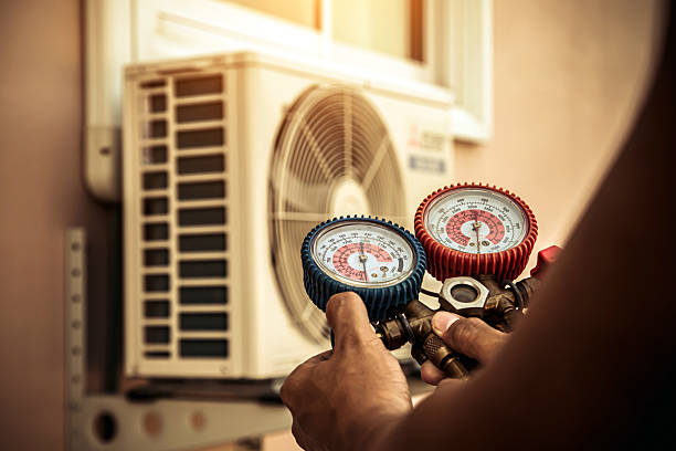Professional Heat Pump Repair technician working in Nunez, GA